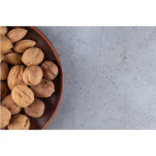 fresh healthy walnuts placed stone table 1 طرح با کیفیت آجیل پسته بادام گردو آلو