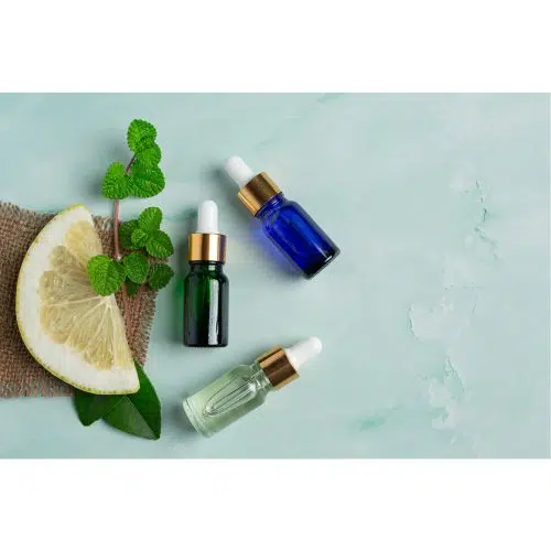 grapefruit oil serum bottle put green light background 1 عطر-بطری-صورتی-دود-مکاپ