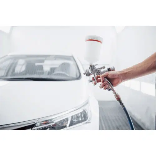 gun with paint hands man paint car 1 تصویر با کیفیت یک انار سرخ و رسیده