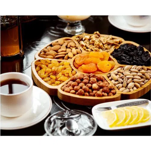 طرح با کیفیت آجیل پسته بادام گردو آلو 1 wooden plate with dried fruits nuts 1 طرح با کیفیت آجیل پسته بادام گردو آلو