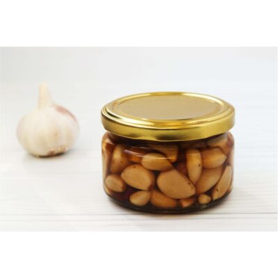 عکس سیر ترشی در ظرف نگهدارنده