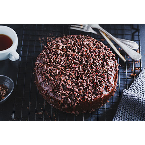 closeup tasty chocolate cake with chocolate chunks baking sheet 1 ماکت-پوستر-نمای-خالی-بالا