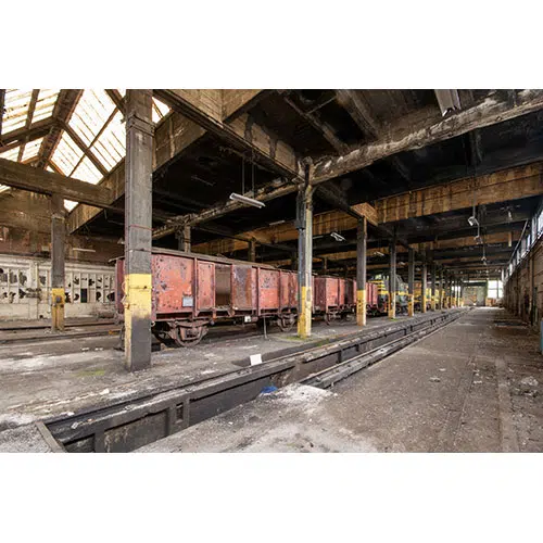 interior shot old warehouse with old trains stored inside 1 تصویر