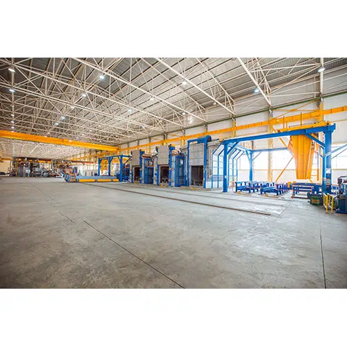 metallic ovens inside big factory with heavy equipments 1 مجموعه