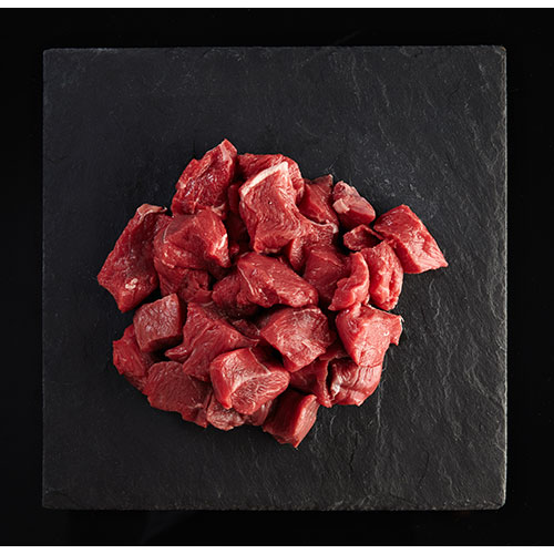 pieces raw fresh meat isolated black stone board 1