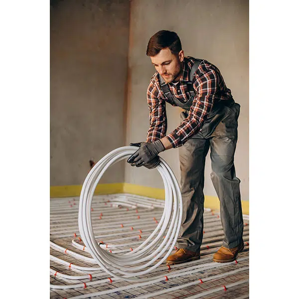 service man instelling house heating system floor 1 تصویر