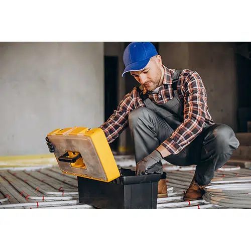 service man instelling house heating system floor 2 تصویر