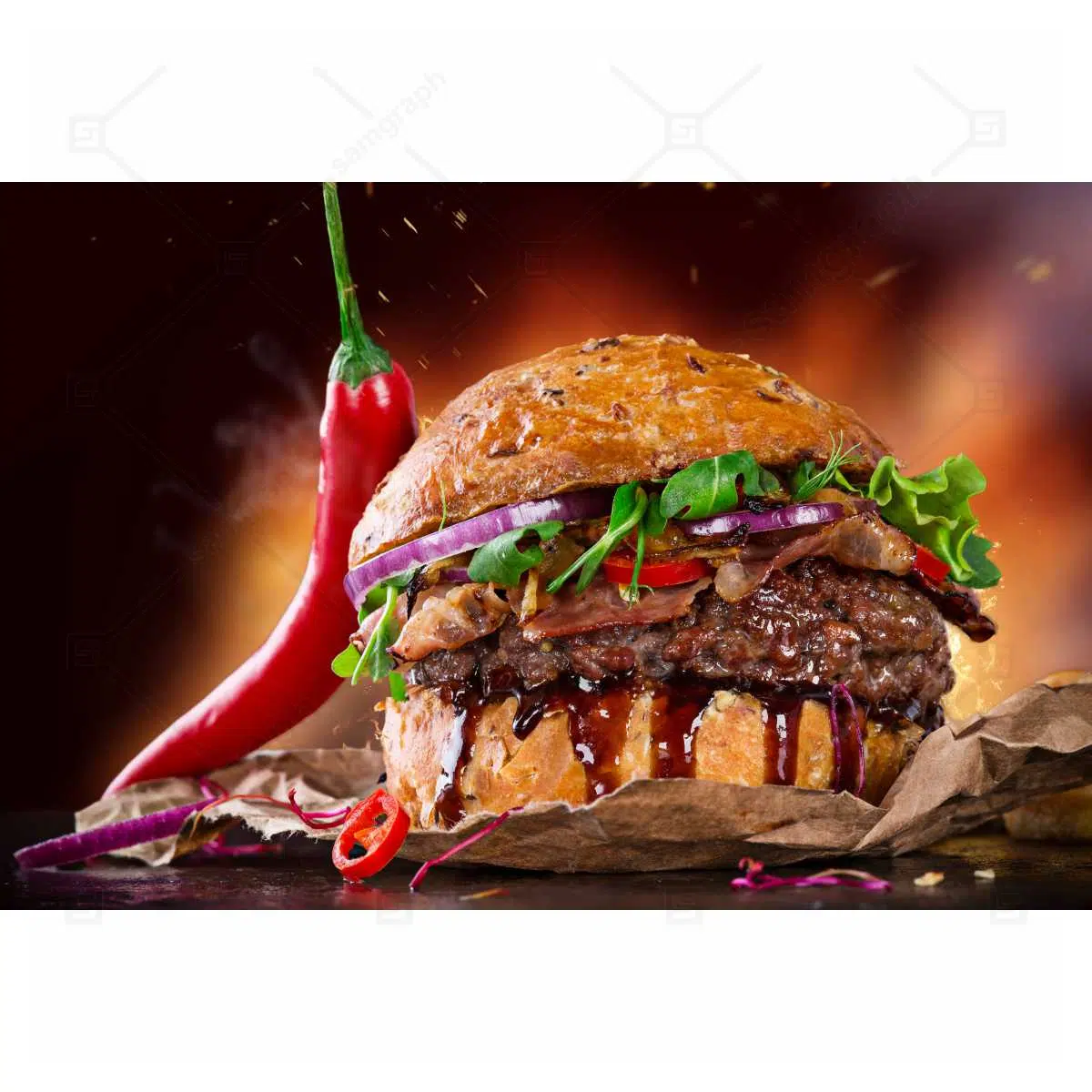 High quality photo of juicy hamburger with fire and pepper lettuce onion parsley 1 عکس با کیفیت همبرگر آبدار با زمینه آتش و فلفل کاهو پیاز جعفری تصویر شماره 2